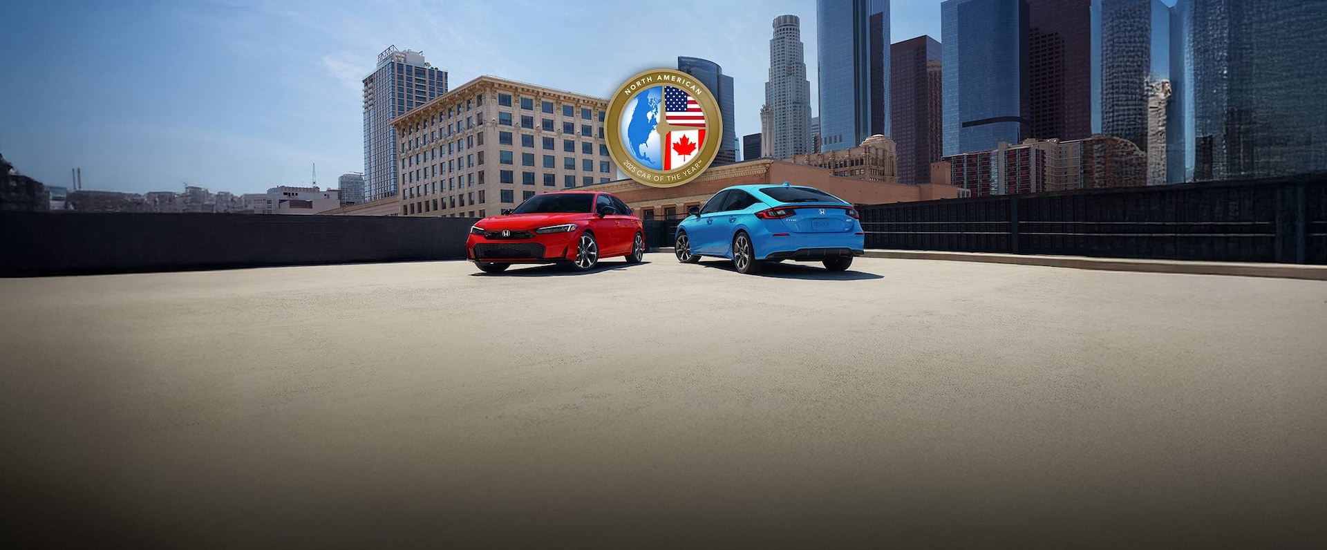 2025 Honda Civic Sedan Sport Touring Hybrid shown in Rallye Red and Civic Hatchback Sport Touring Hybrid shown in Boost Blue Pearl parked on a rooftop, with buildings on the background