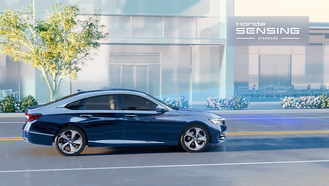 Demonstration of Honda Sensing® features. Plays video. Opens a dialog. 