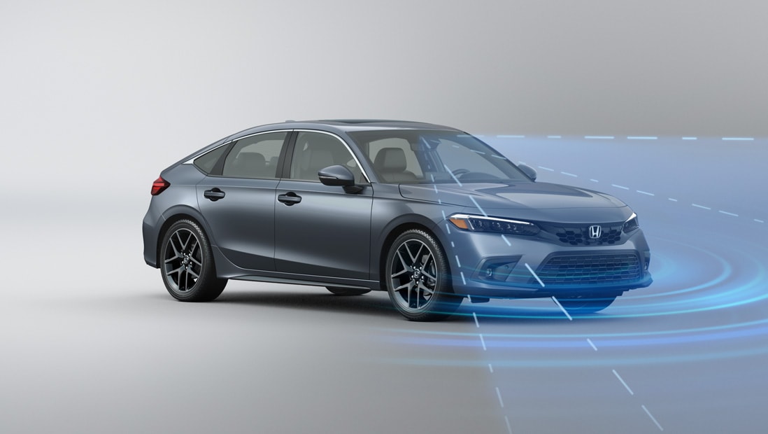 Front passenger-side view of the 2022 Honda Civic Sport Touring Hatchback in Sonic Gray Pearl with illustrated lines demonstrating Honda Sensing® feature. 