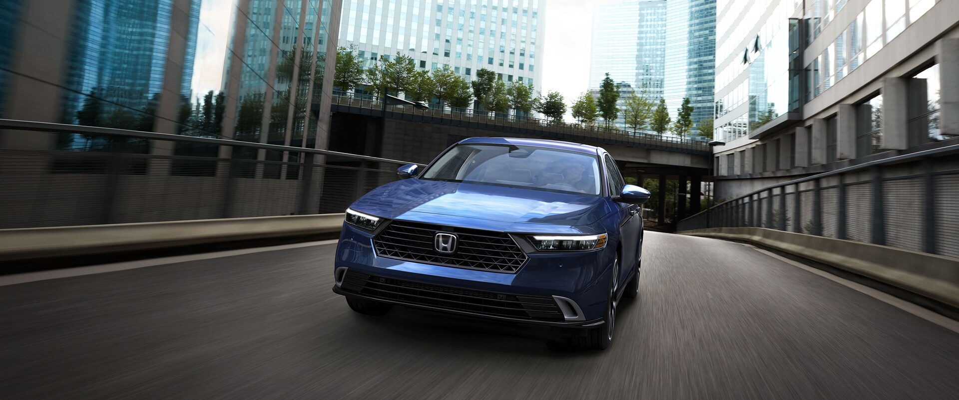 Interior dashboard of the 2026 Honda Accord showing the large central touchscreen and digital driver display, which supports Honda Sensing information