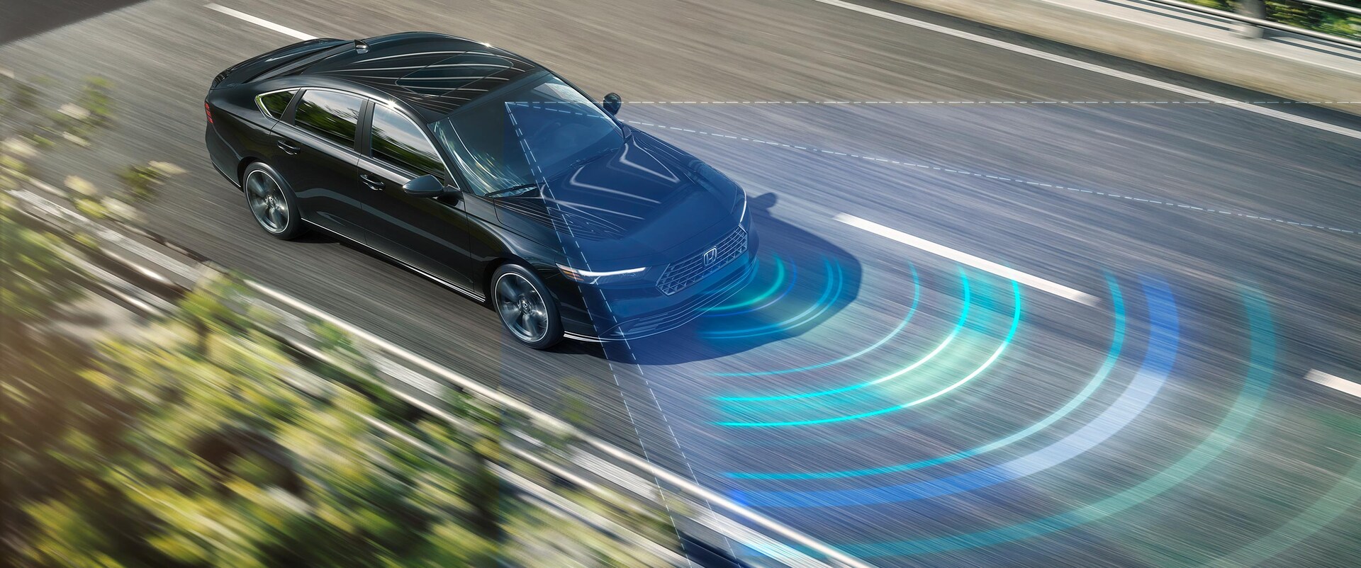 Red 2026 Honda Accord driving dynamically on a highway curve, illustrating active safety features