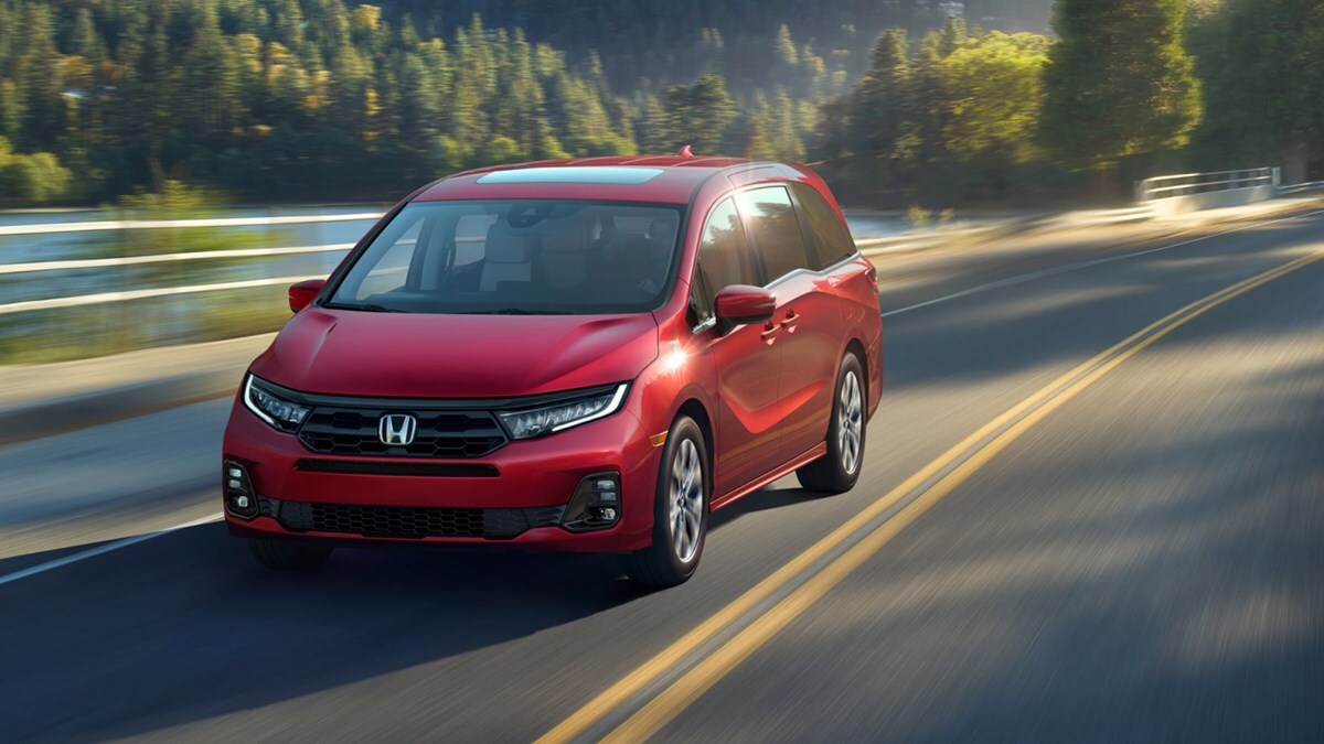 2026 Honda Odyssey Elite exterior in Radiant Red Metallic II