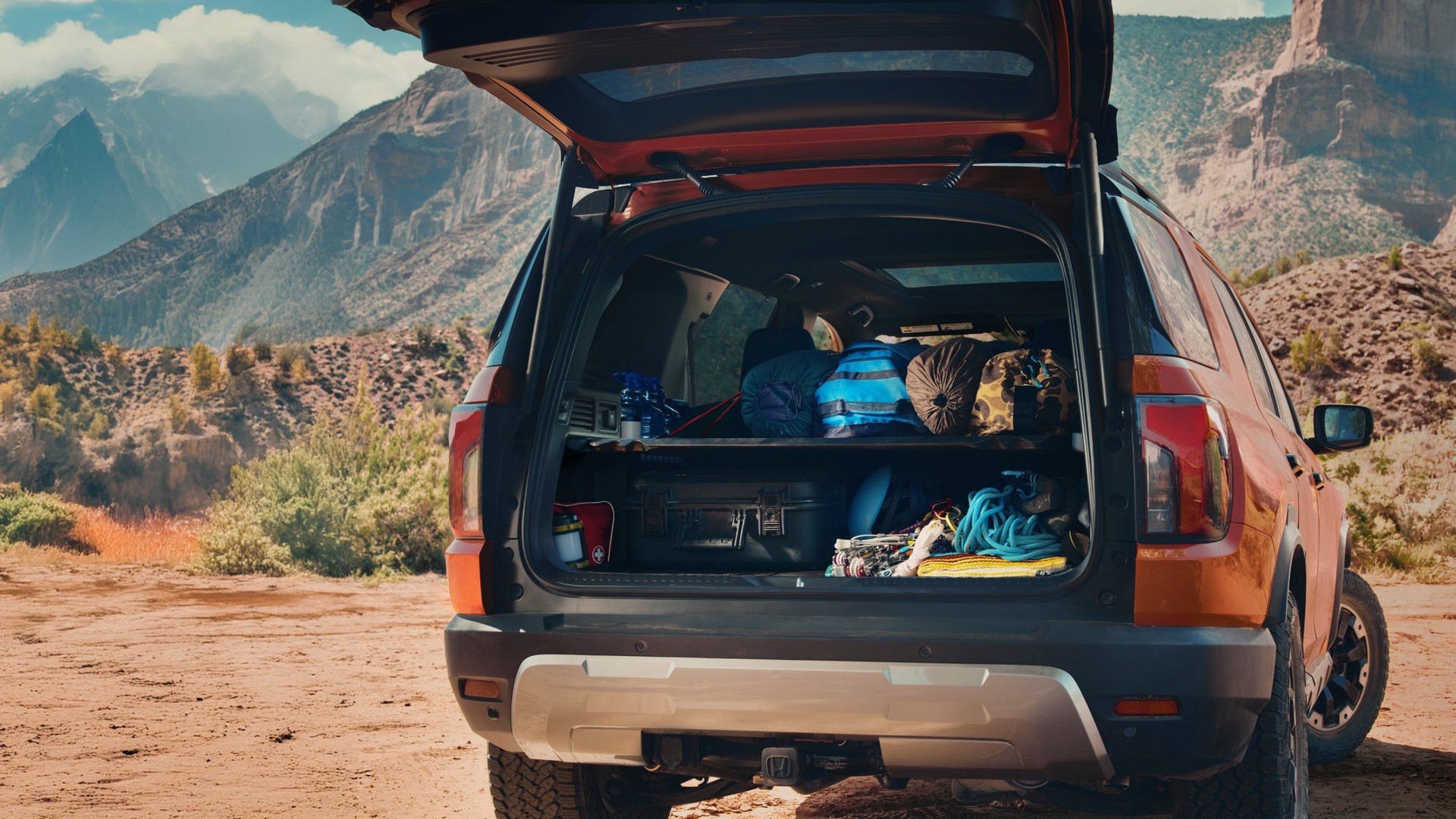 2026 Honda Passport cargo area 44 cubic feet wide opening golf bags mountain bikes