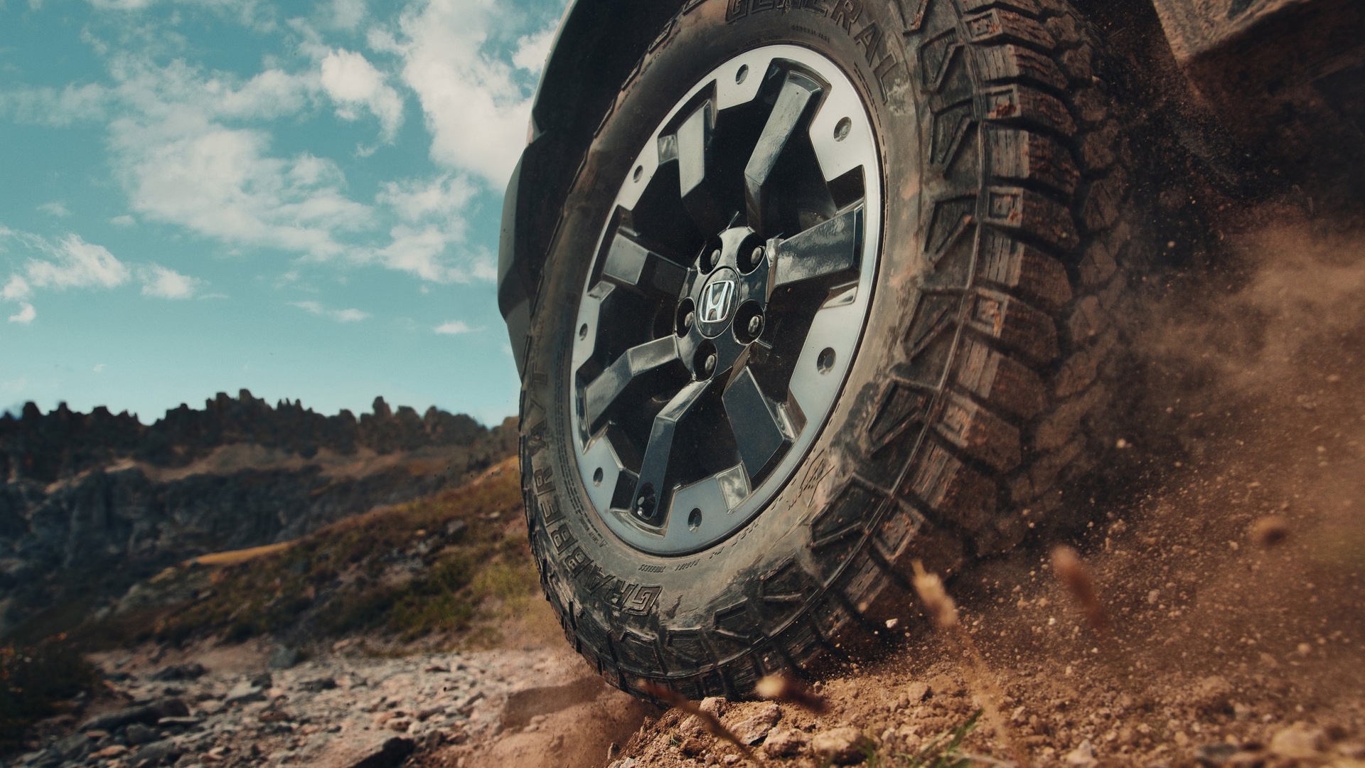 2026 Honda Passport exterior styling flared fenders aggressive stance wider body