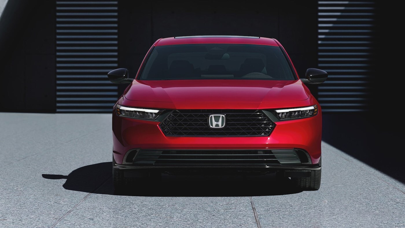 Front view of a 2026 Honda Accord Sport-L Hybrid in Radiant Red Metallic
