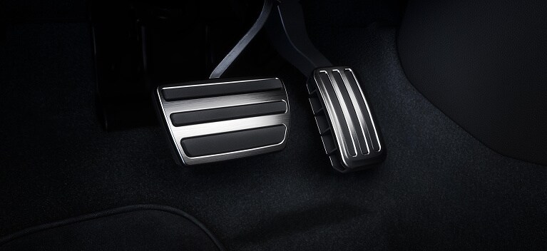 2026 Honda Civic Hatchback close up of the sport pedals with metallic finish (Compact Hatchback).