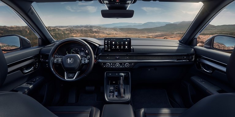 2027 Honda CR-V dashboard with touchscreen infotainment and steering wheel (Compact Crossover SUV).