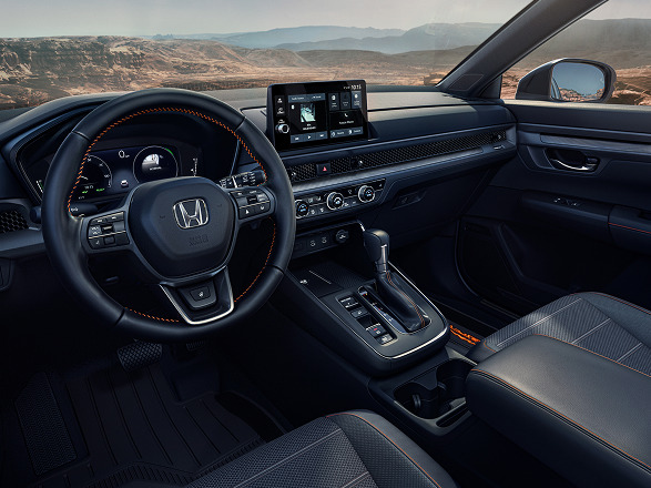2027 Honda CR-V dashboard and steering wheel with orange stitching (Compact Crossover SUV).