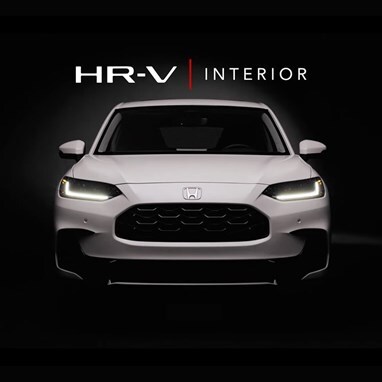 2027 Honda HR-V EX-L in Platinum White Pearl three quarter view in with Interior text (Subcompact Crossover SUV).