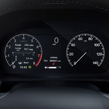 Honda Odyssey digital instrument cluster showing speedometer and tachometer (Minivan).
