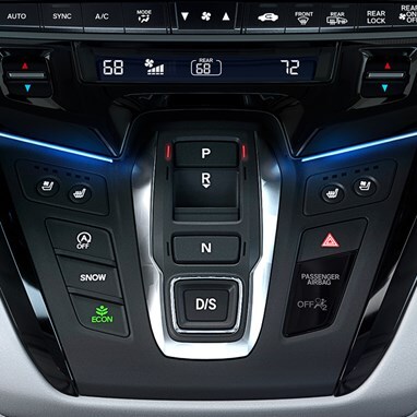 2027 Honda Odyssey Elite push-button gear selector inside the modern van console (Minivan).