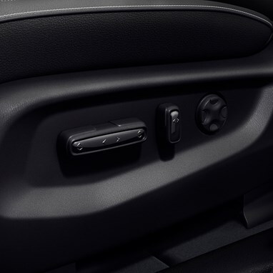 Honda Odyssey modern van close up detail of the power seat adjustment controls on the driver seat (Minivan).