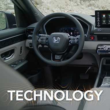 2027 Honda Passport TrailSport Elite dashboard with infotainment screen and steering wheel (Mid-Size SUV).