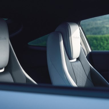 2027 Honda Prelude front seats headrest with embossed Prelude logo detail (exhilarating hybrid coupe).