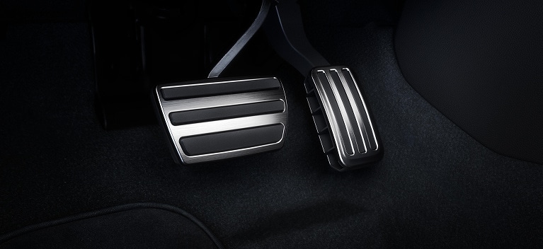 2025 Honda Civic Hatchback close up of the sport pedals with metallic finish (Compact Hatchback).