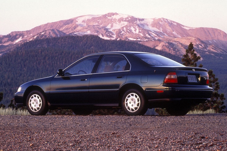 Honda Accord with mountains in the background, representing 11 generations of innovation in technology, safety, fuel efficiency, and reliability.