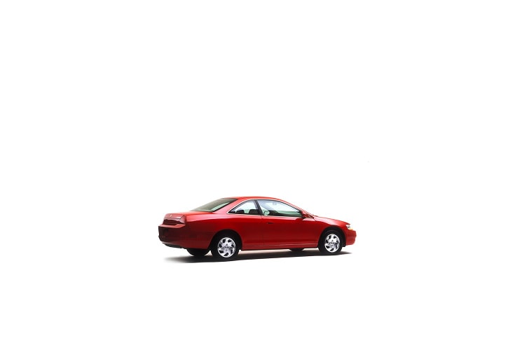 1998 Honda Accord, three-quarter rear view, in a professional studio environment.