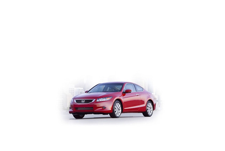 2008 Honda Accord, three-quarter view, in a professional studio environment.