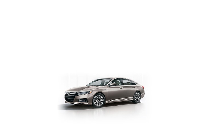 2018 Honda Accord, three-quarter view, in a professional studio environment.