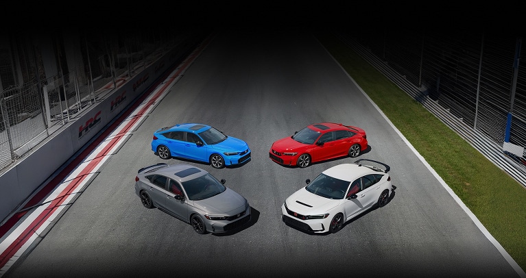 2027 Honda Civic Sedan top parked on a professional racetrack (Compact Sedan).