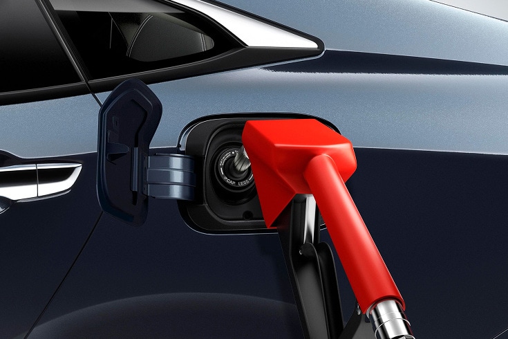 2026 Honda Civic Sedan in Blue Lagoon Pearl profile studio showing the capless fuel filler (Compact Sedan). 2026 Honda Civic Sedan in Blue Lagoon Pearl profile studio showing the capless fuel filler (Compact Sedan).
