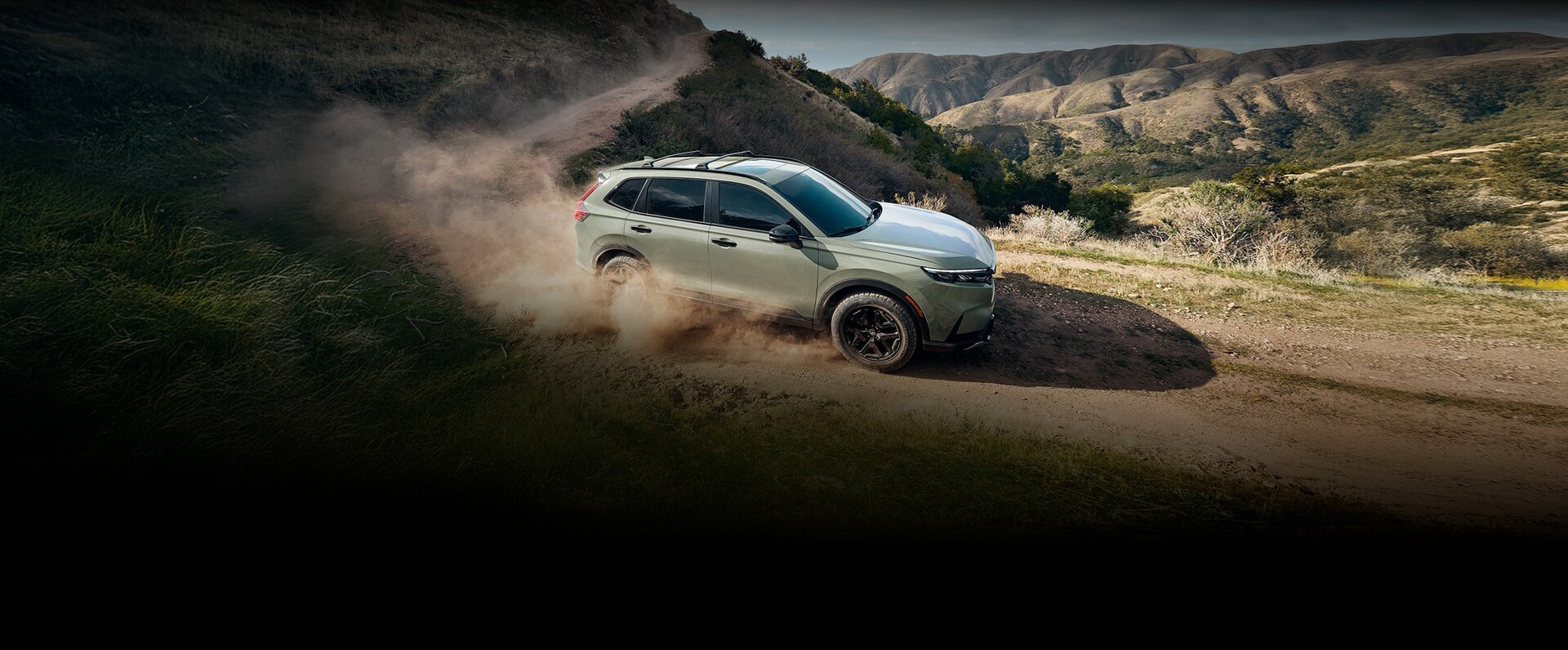 2026 Honda CR-V reveal image showing CR-V TrailSport Hybrid in Ash Green Metallic
